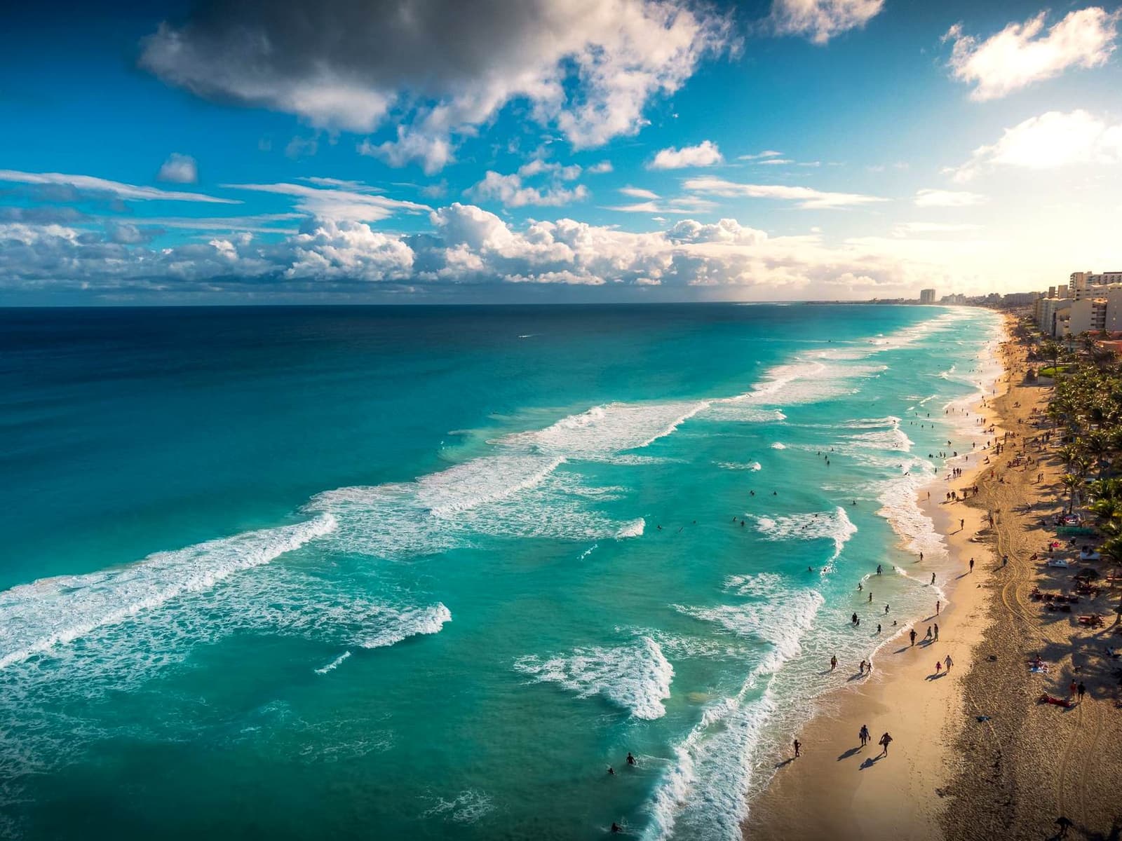 Turquoise surf along the Cancun shoreline