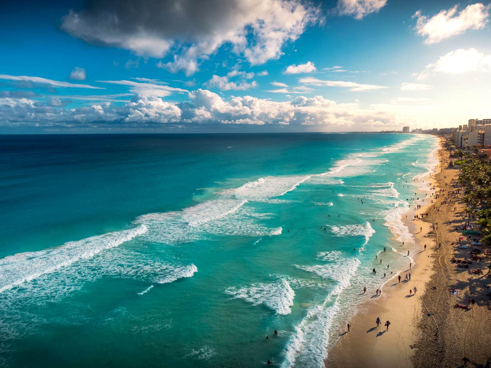 Turquoise surf along the Cancun shoreline